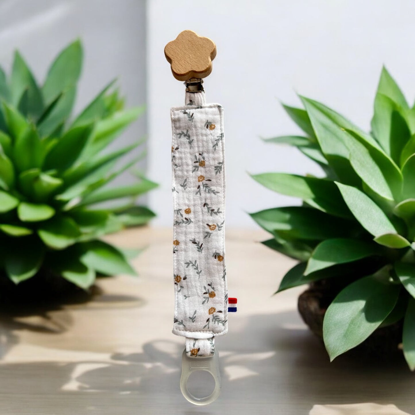 Attache tétine fleurs