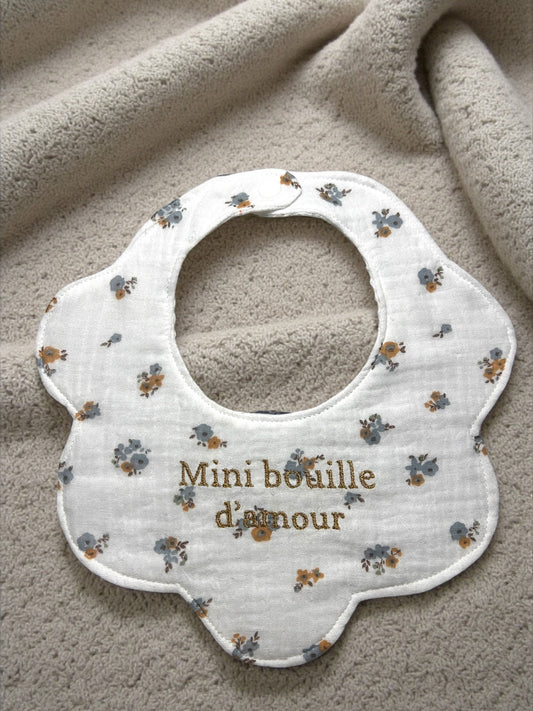 Bavoir forme fleur brodé