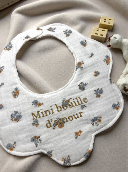 Bavoir forme fleur brodé