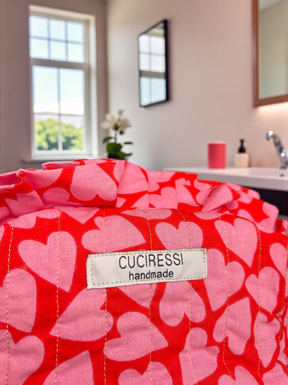 Trousse de toilette matelassée cœurs