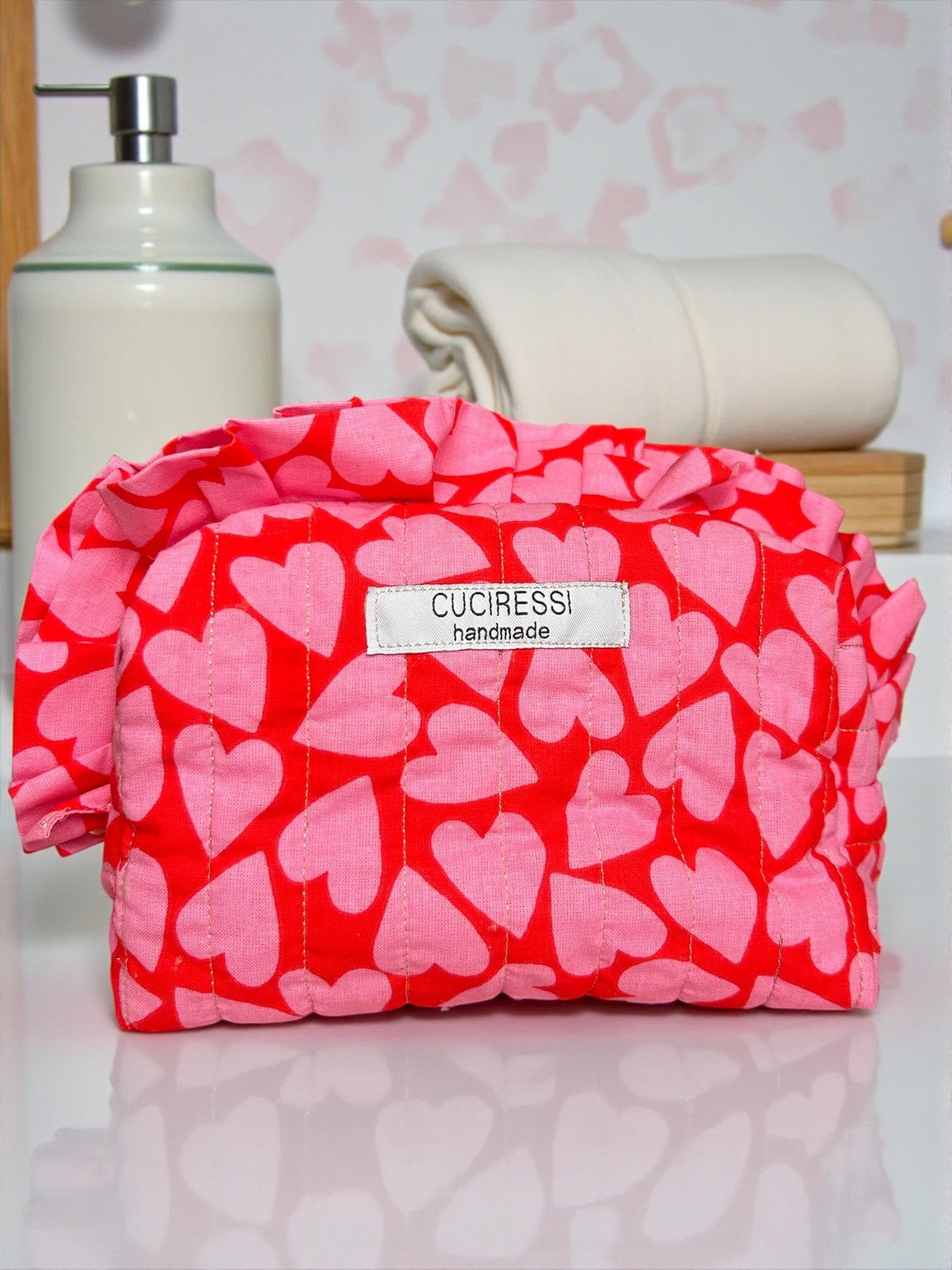Trousse de toilette matelassée cœurs