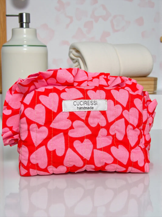 Trousse de toilette matelassée cœurs